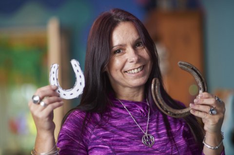 PIC by Matt Lincoln/MERCURY PRESS (PICTURED: KATE HAVORD, 47 FROM CHIPPENHAM, HOLDING A HORSE HOOVE AND ONE THAT SHE MADE (LEFT)) A woman has admitted she lived as a horse EVERY DAY until the age of 13 ñ galloping around on all fours, wearing a bridle and even eating grass.   Equestrian escapades were all part of the daily routine for art therapist Kate Havord for seven years between the ages of six and 13.   The 47-year-old said a ëhorse spirití first entered her when she won an all fours running race at school and eventually had 32 distinct horse personalities she could call upon at any given moment. SEE MERCURY COPY