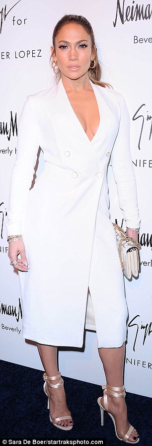 Jennifer Lopez Suffers A Wardrobe Malfunction At Her Shoe Launch Party