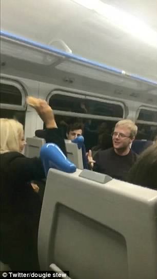 Moment Fight Broke Out On A Train After Woman Put A Bagel On A Man’s Head