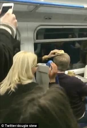 Moment Fight Broke Out On A Train After Woman Put A Bagel On A Man’s Head