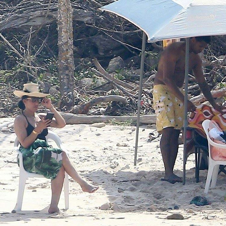 Usher Photo’d Helping His Wife Take Out Her Weave On At The Beach