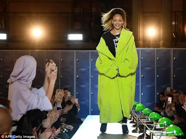Rihanna in a huge lime green coat 