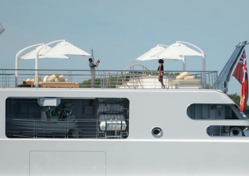 Barack Obama Snaps Photo Of Wife Michelle Obama Aboard A Yacht In The South Pacific
