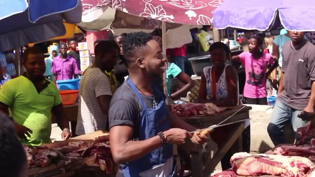 Adekunle Gold Turns Butcher While Shooting WORK Video 1