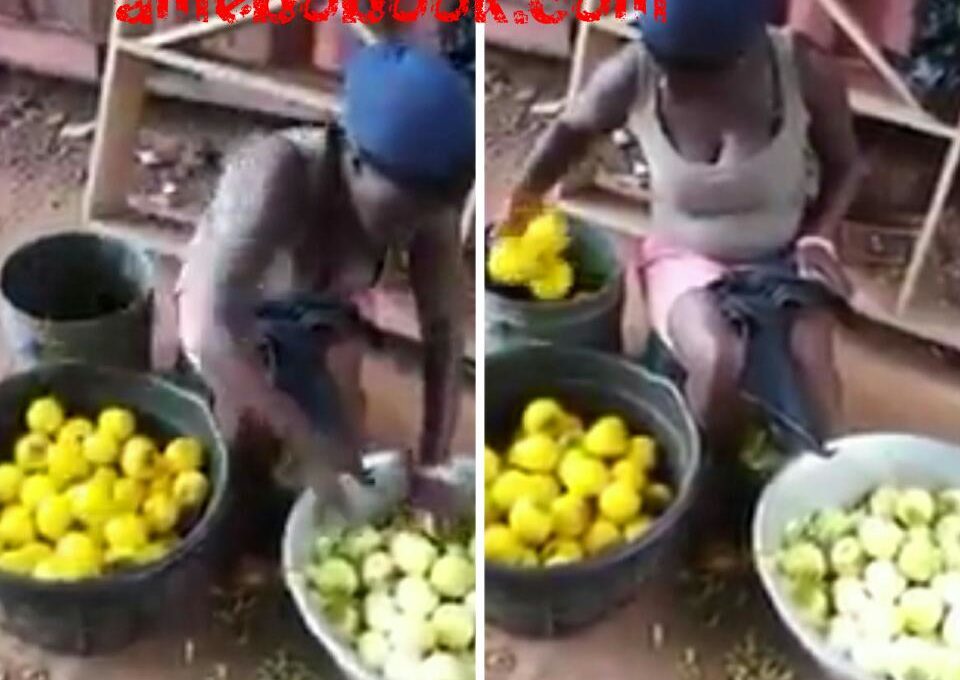 Woman Dyeing Unripe Oranges To Make It Look Ripe