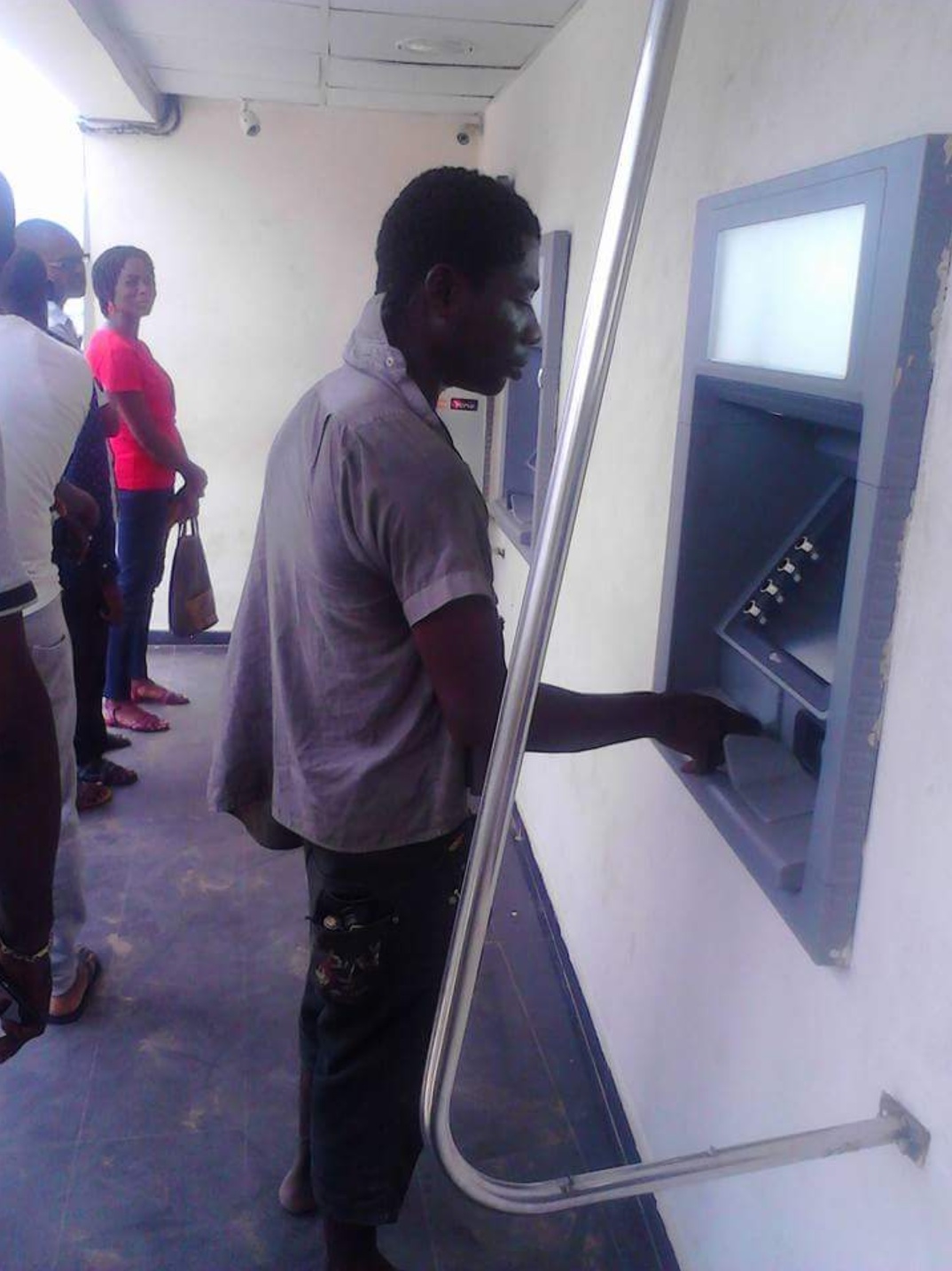 Mad Man Attempted Withdrawing At An ATM (1)