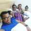 Van Vicker And Wife Adjoa Alongside Their Children In Bed Shoot