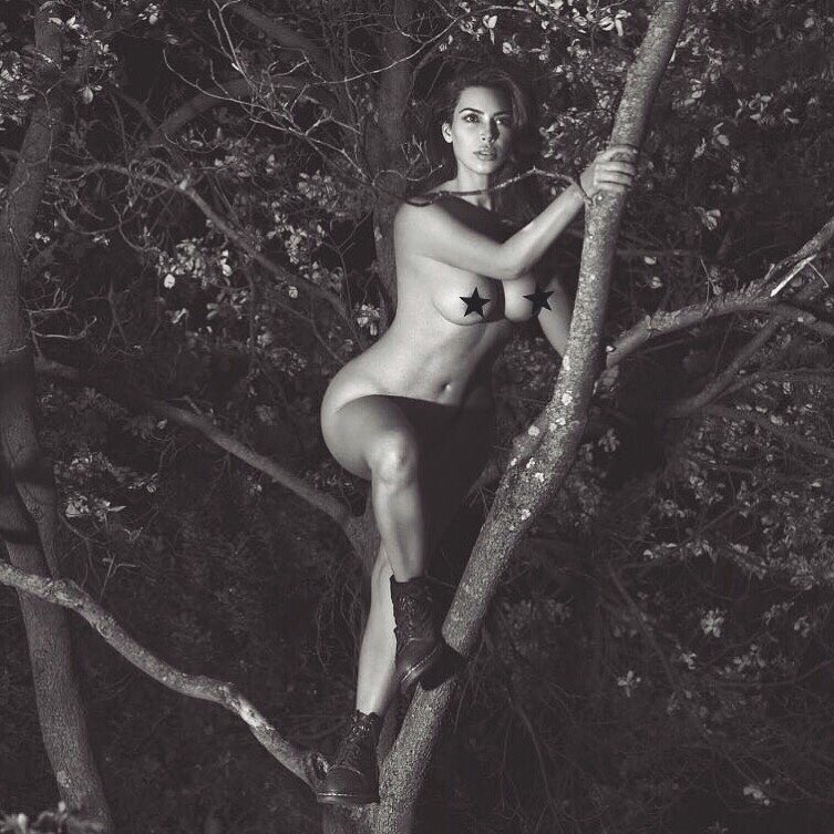 Kim Kardashian Goes Completely Naked While Climbing Tree (1)