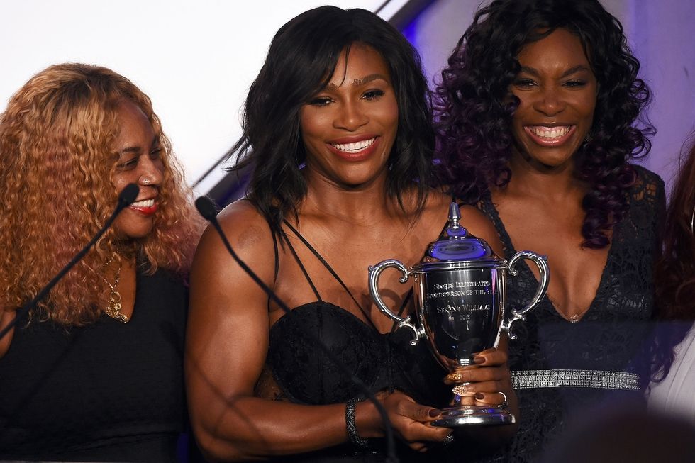 Serena Williams with her mum, Oracene Price (left), and sister Venus (right) in 2015