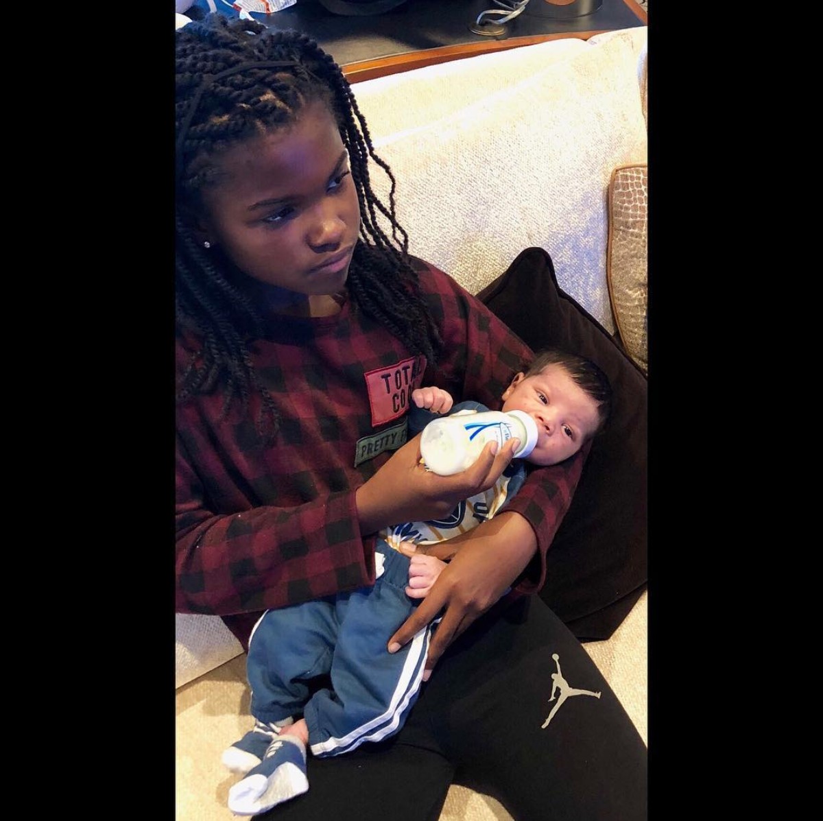 Kevin Hart's Daughter Pictured Bottle-Feeding Baby Kenzo (2)