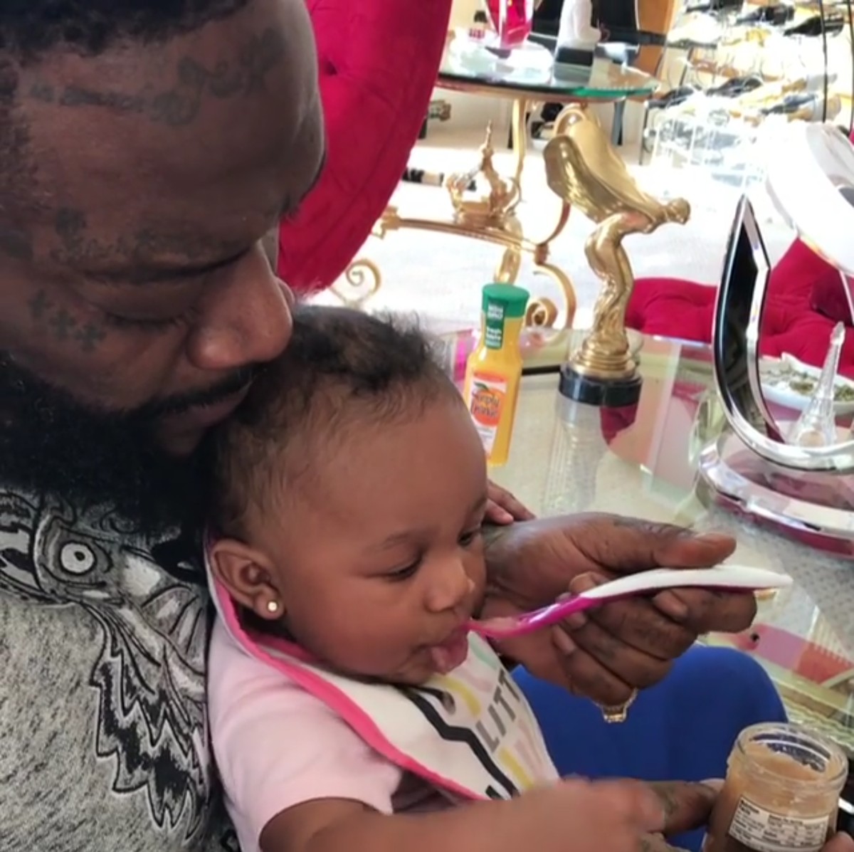 Rick Ross Daughter Hermes Eating From A Spoon For The First Time (3)