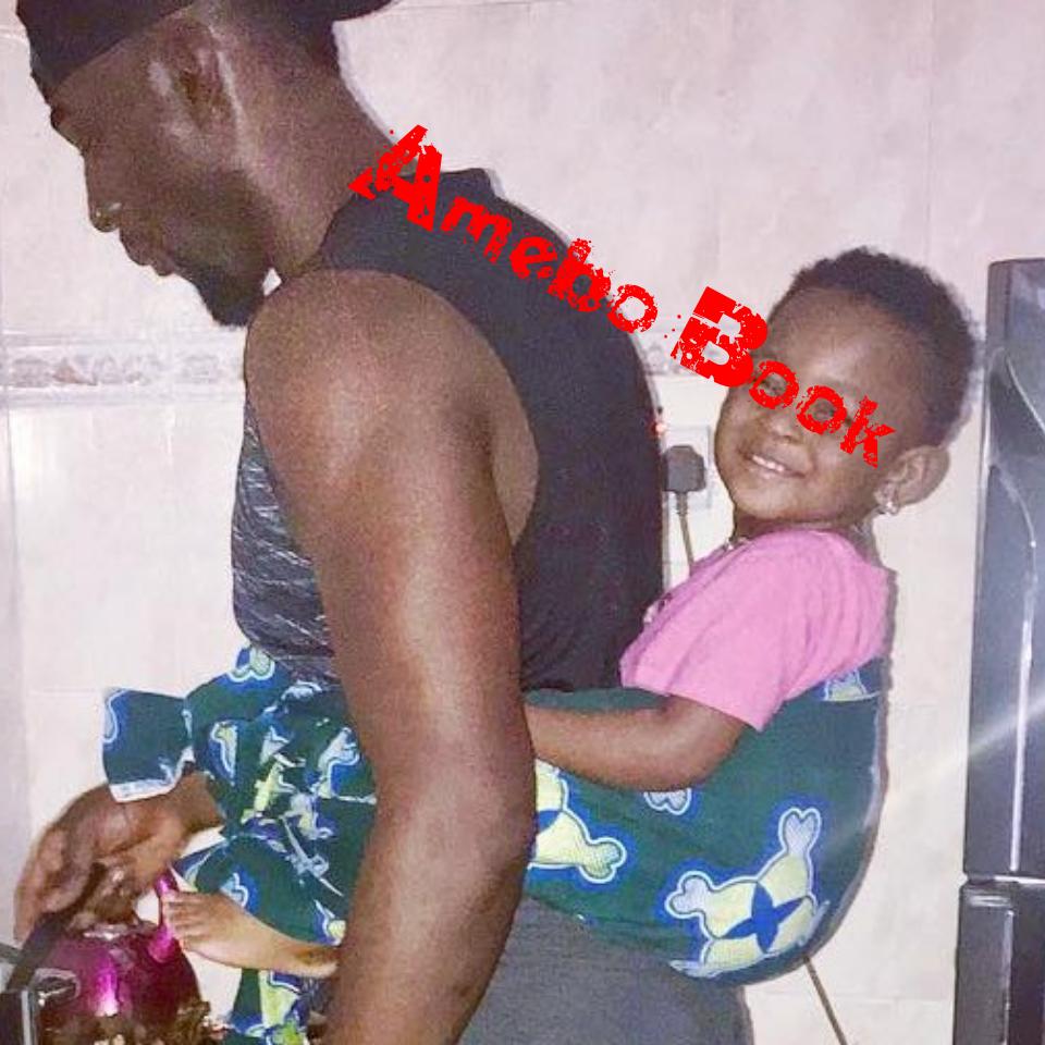 Gbenro Ajibade Pictured Cooking With Baby Strapped On His Back