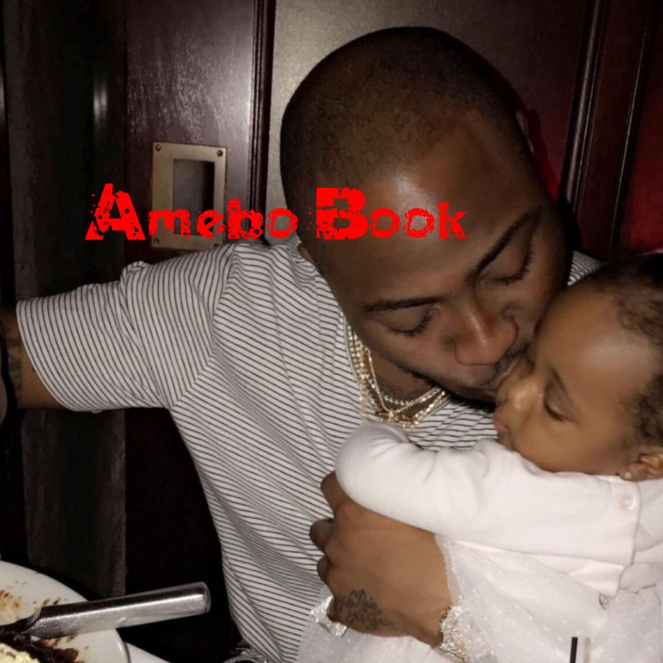 Davido Gives 2nd Daughter Hailey A Kiss While Having Dinner