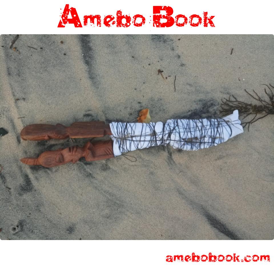 Male And Female Figurines Tied Together That Washed Up Ashore At Fajara Beach, Gambia