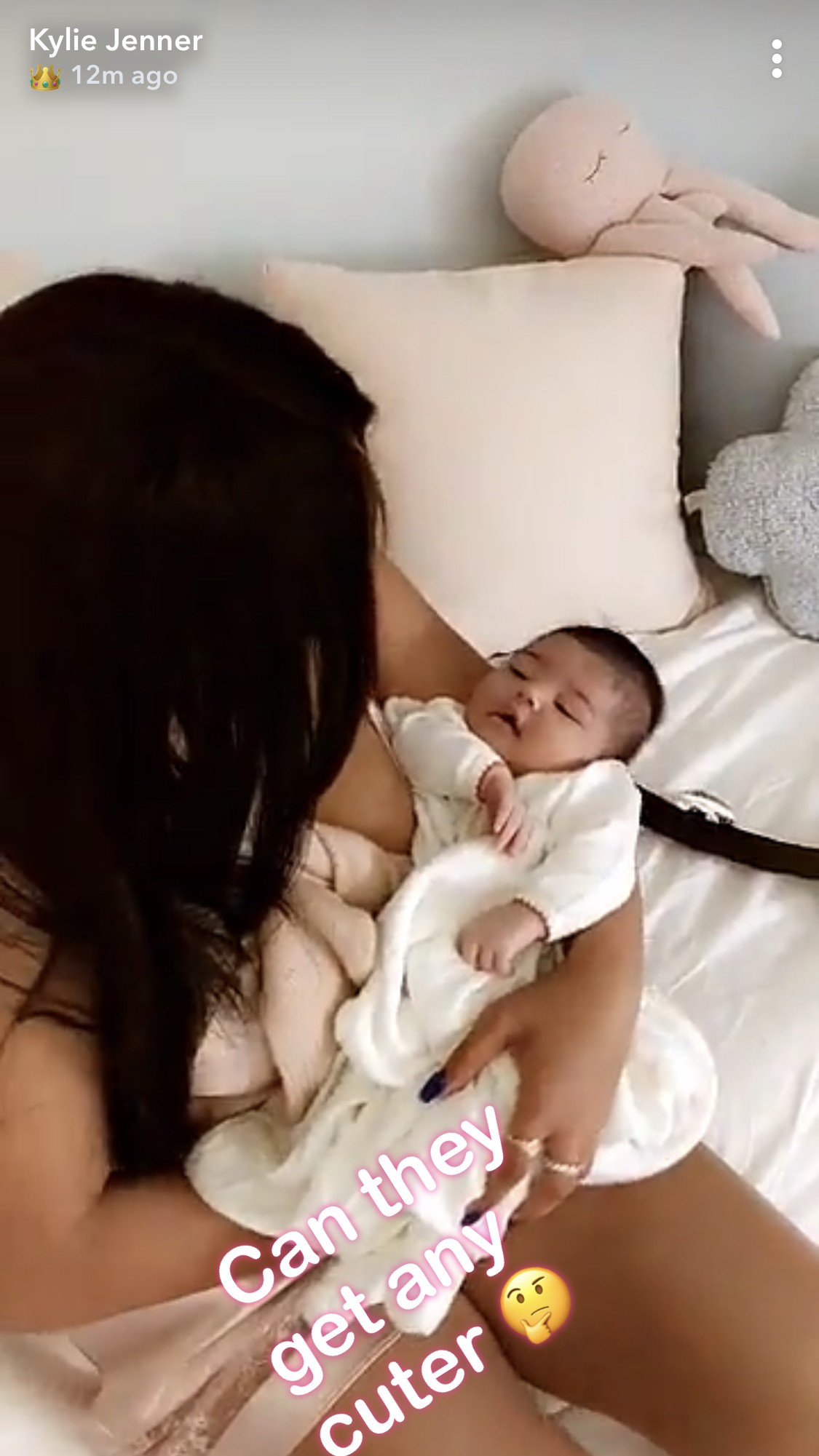 Jordyn Woods Cradling Baby Stormi