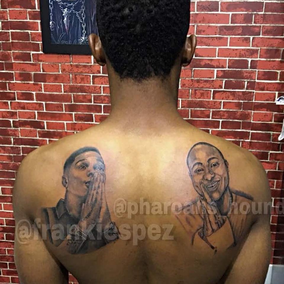 Nigerian Man Tattoos Wizkid And Davido’s Face On His Back