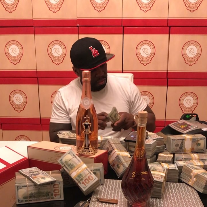 50 Cent Playing Around With Wads Of Cash