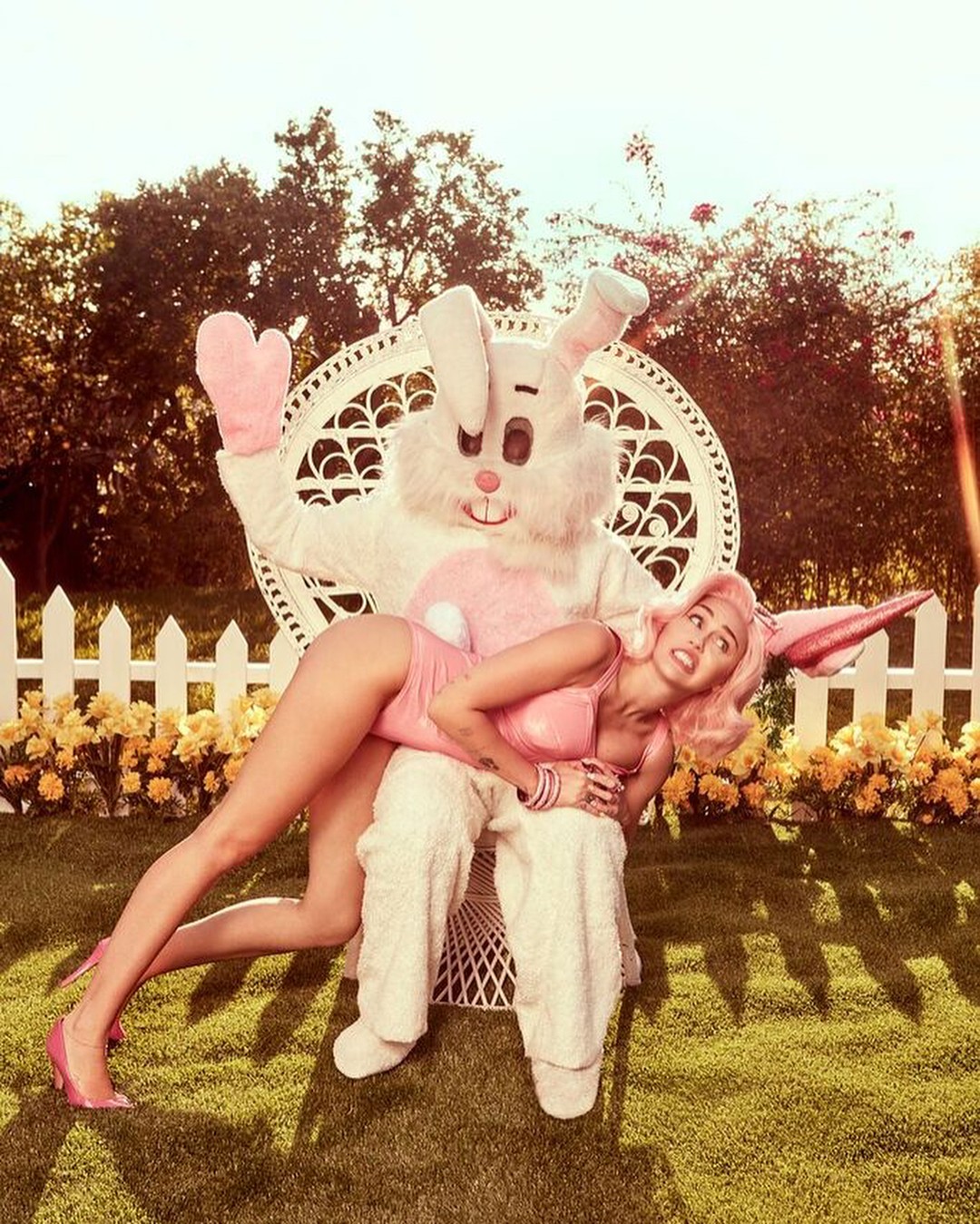 Miley Cyrus Celebrates Easter With Photos Of A Bunny Spanking Her.