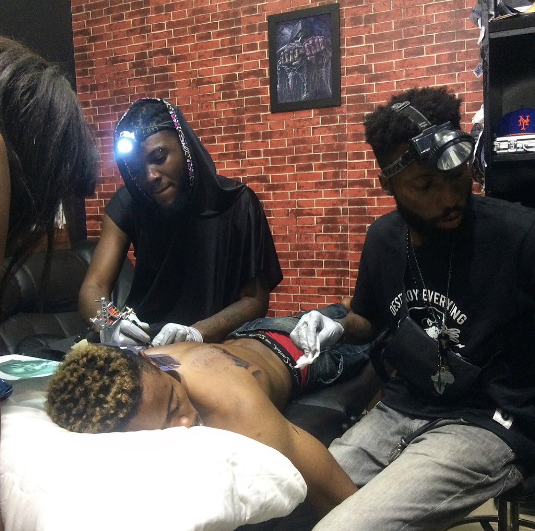 Nigerian Man Tattoos Wizkid And Davido’s Face On His Back (3)