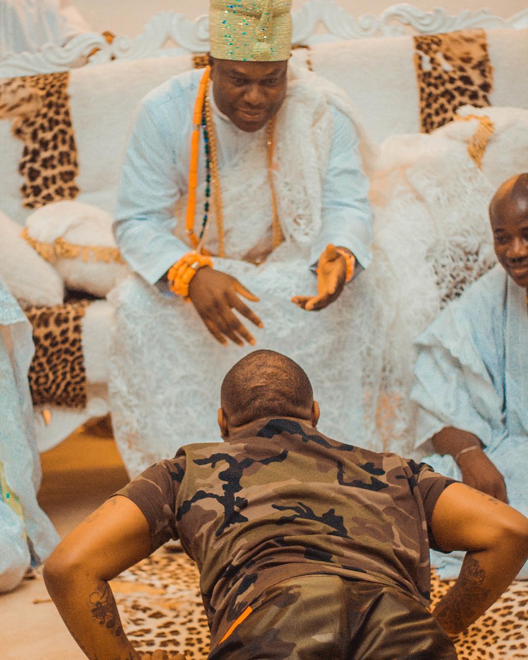 Davido Prostrating Before Ooni of Ife