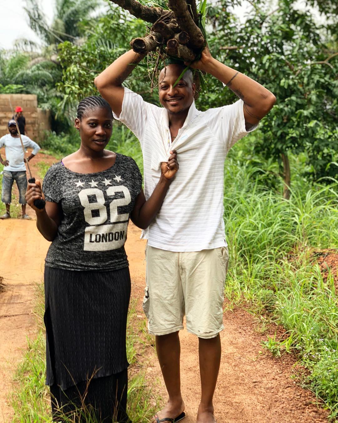 IK Ogbonna Carries Firewood While Posing With Mercy Johnson (2)