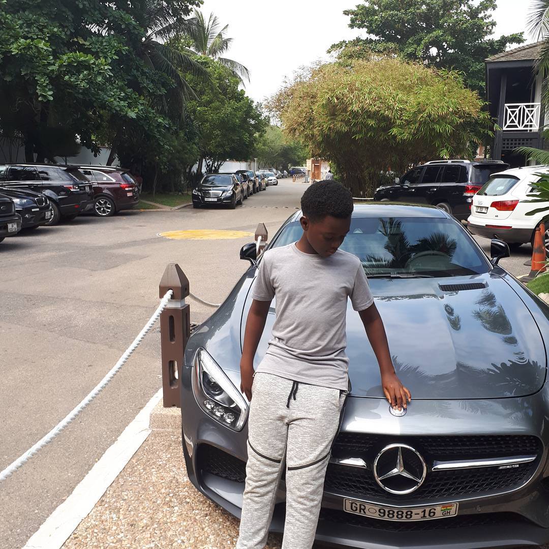 Damien Peter Agyemang Poses By New Car