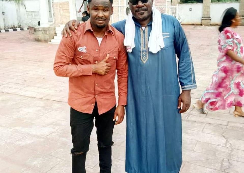 Zubby Michael Poses With Sam Dede On Set