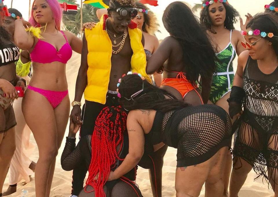 Shatta Wale Surrounds Himself With Bikini Girls In Island Video Shoot