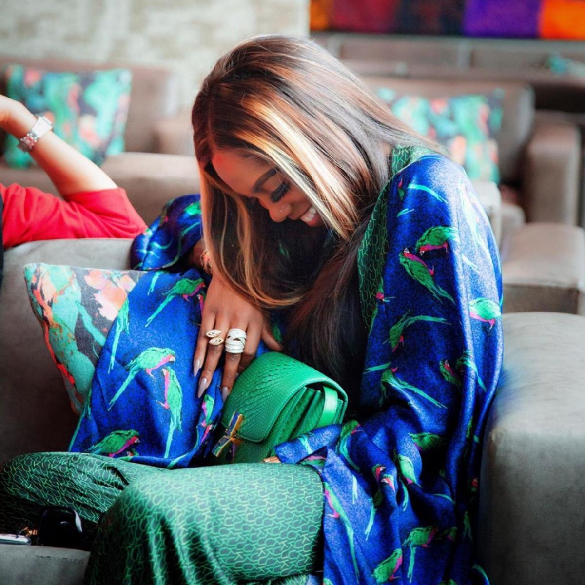 Tiwa Savage Playfully Attempts To Slap Wizkid Over Teni