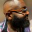 Rick Ross Cuts His Grass