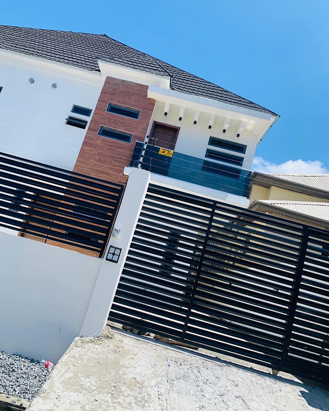 Naira Marley Buys Younger Brother N85Million Mansion In Lekki (2)