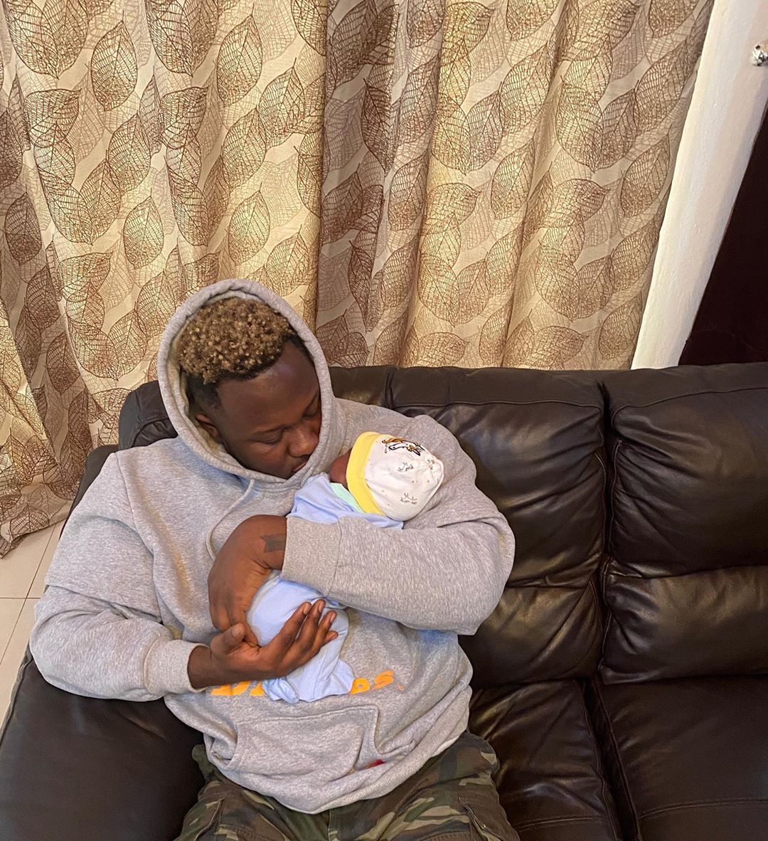 Medikal Cradles Daughter Island Frimpong